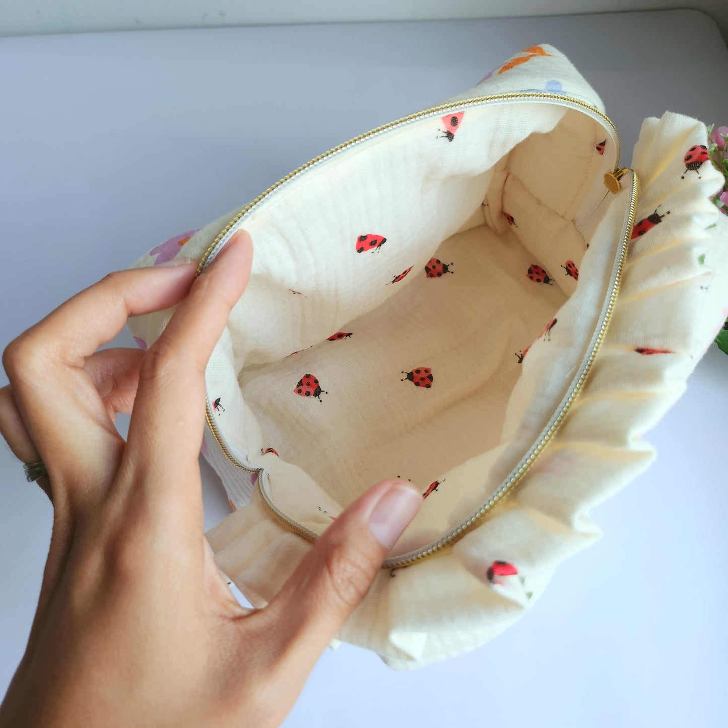 a. Yola Cosmetic Bag with Ruffle