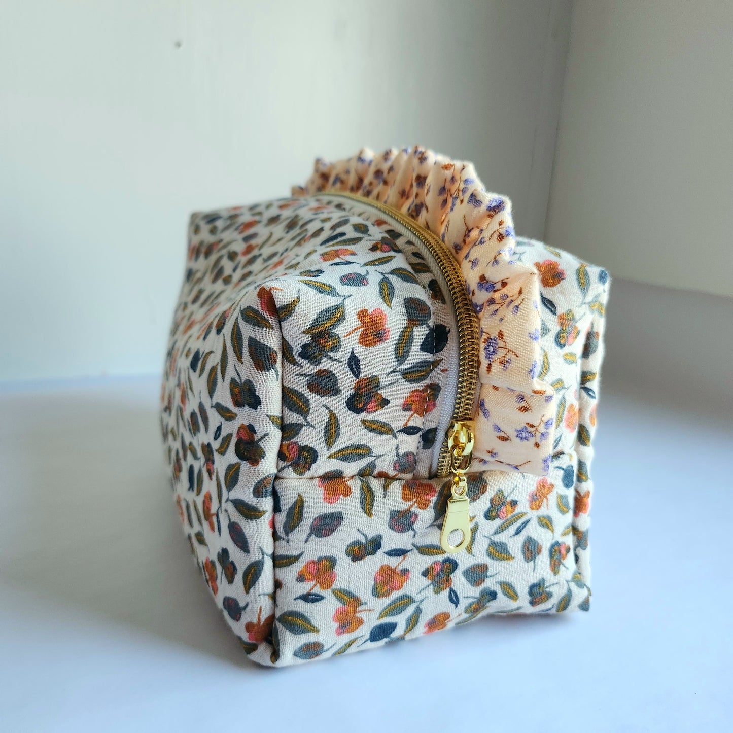 b. Yola Cosmetic Bag with Ruffle