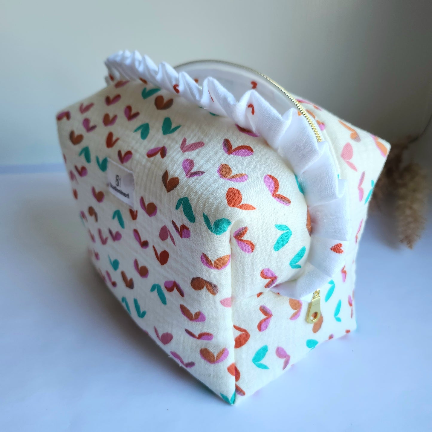 c. Yola Cosmetic Bag with Ruffle