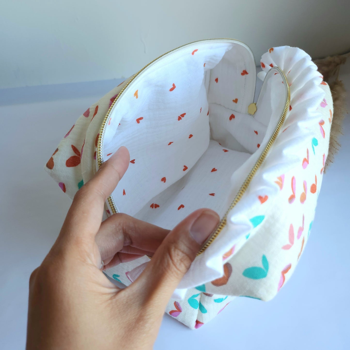 c. Yola Cosmetic Bag with Ruffle