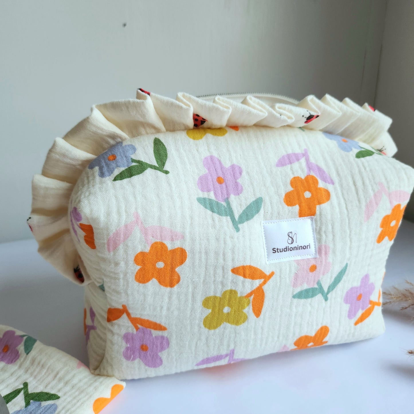 a. Yola Cosmetic Bag with Ruffle