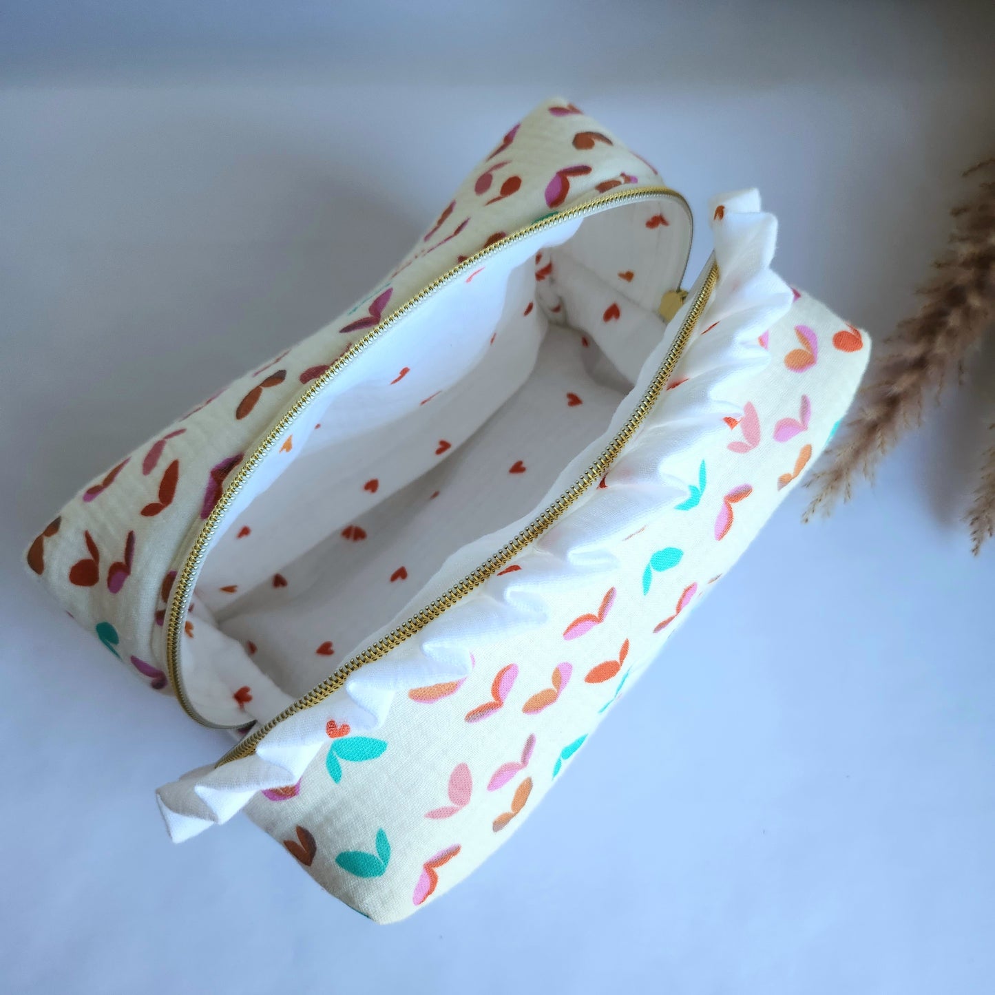 c. Yola Cosmetic Bag with Ruffle