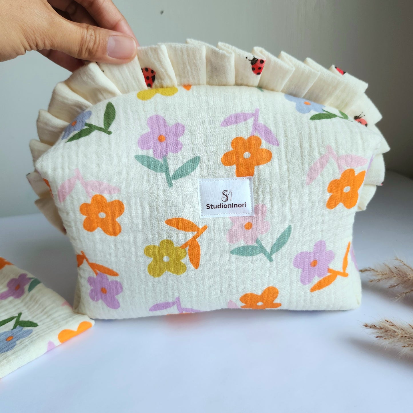 a. Yola Cosmetic Bag with Ruffle